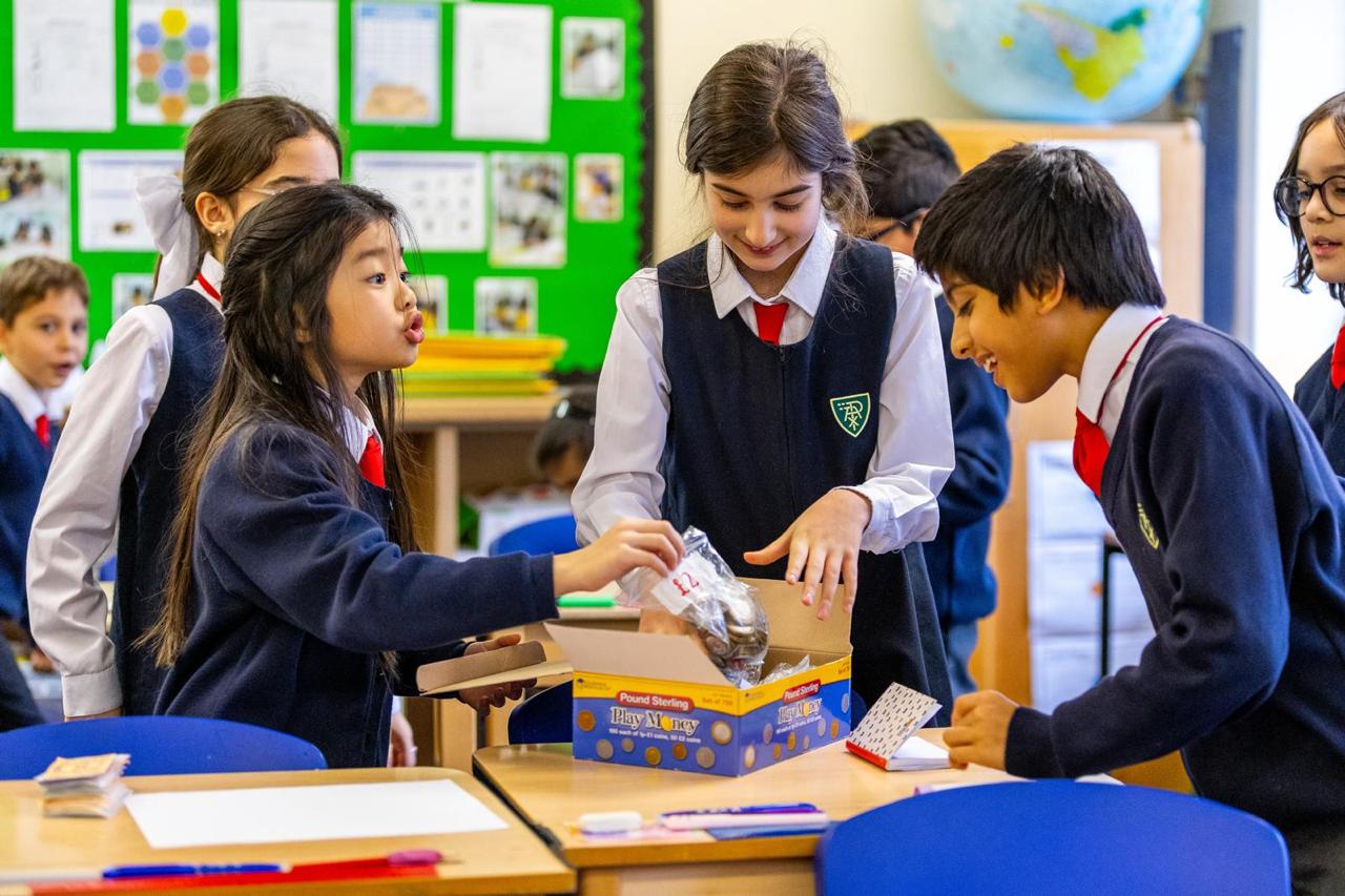Prep pupils working together on a practical maths activity at Vita et Pax, Southgate